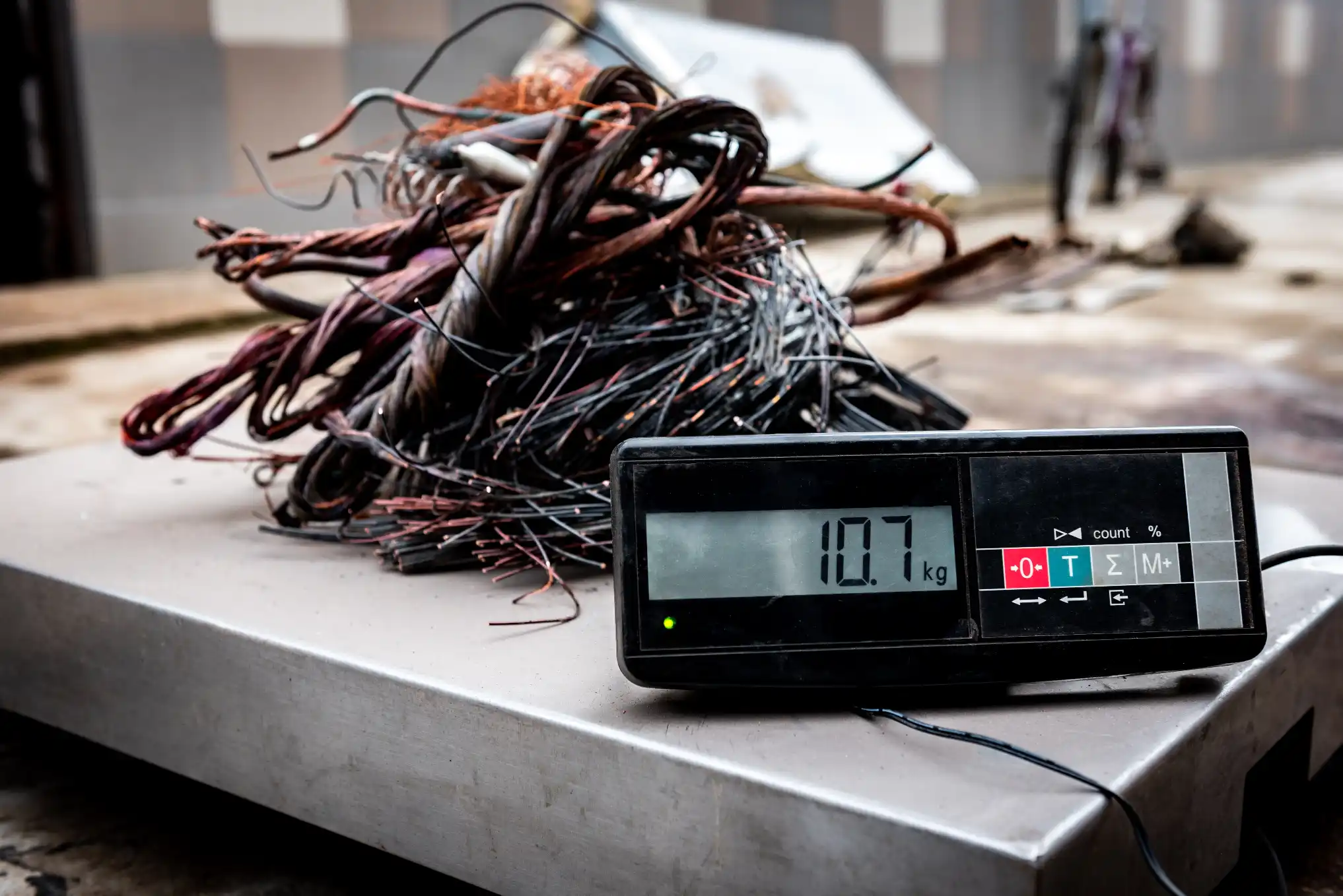 Scrap metal load being weighed and checked before payment