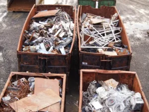 Mixed copper, aluminium, brass and steel scrap at a recycling facility